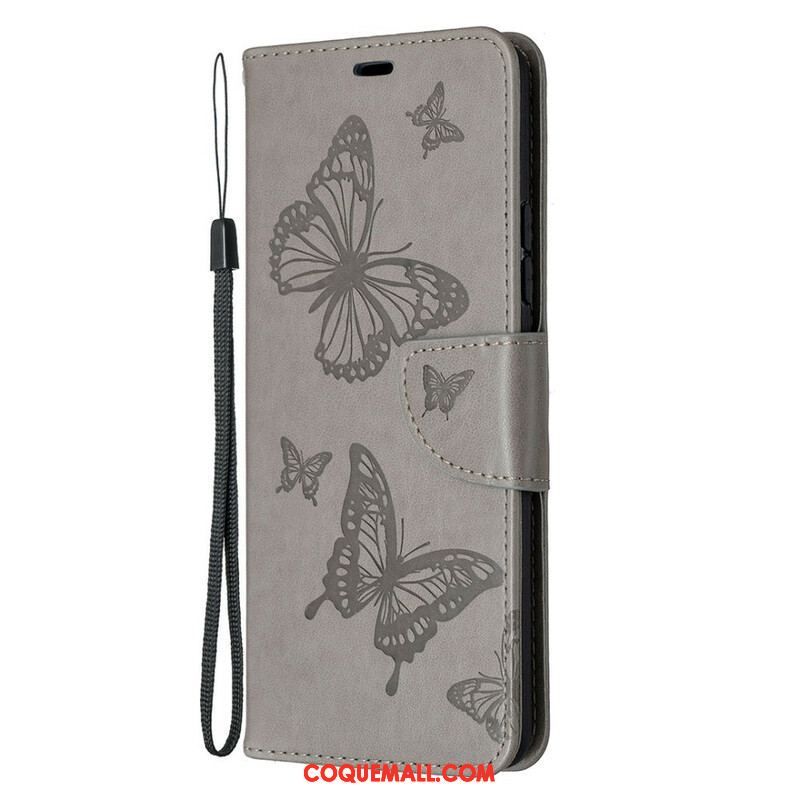Housse Samsung Galaxy A42 5G Les Papillons en Vol avec Lanière