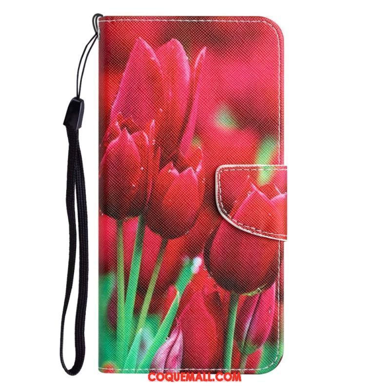 Housse iPhone 15 Déclinaison Florale à Lanière