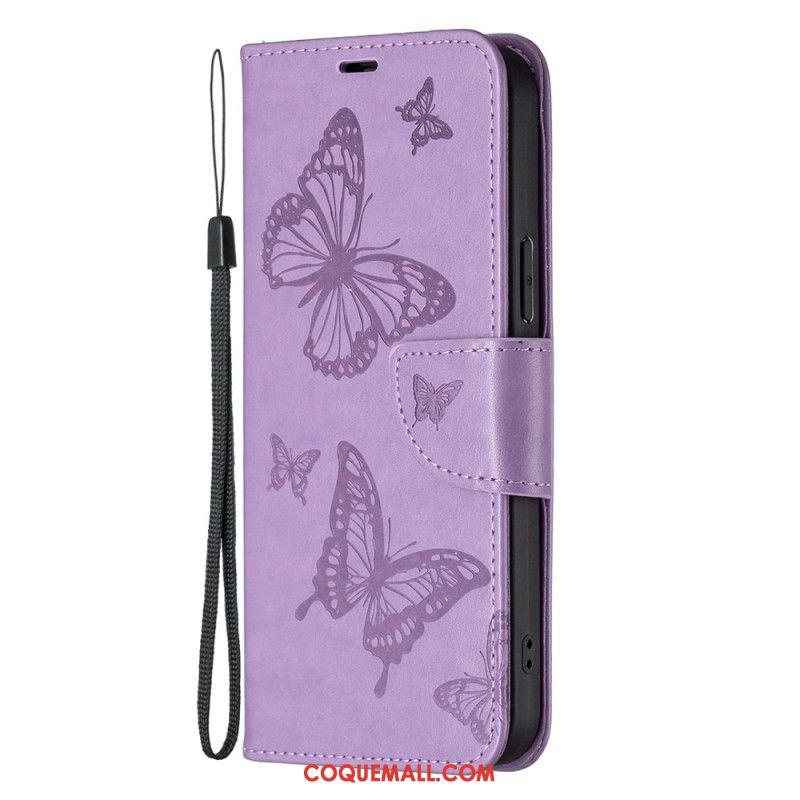 Housse iPhone 16 Papillons à Lanière